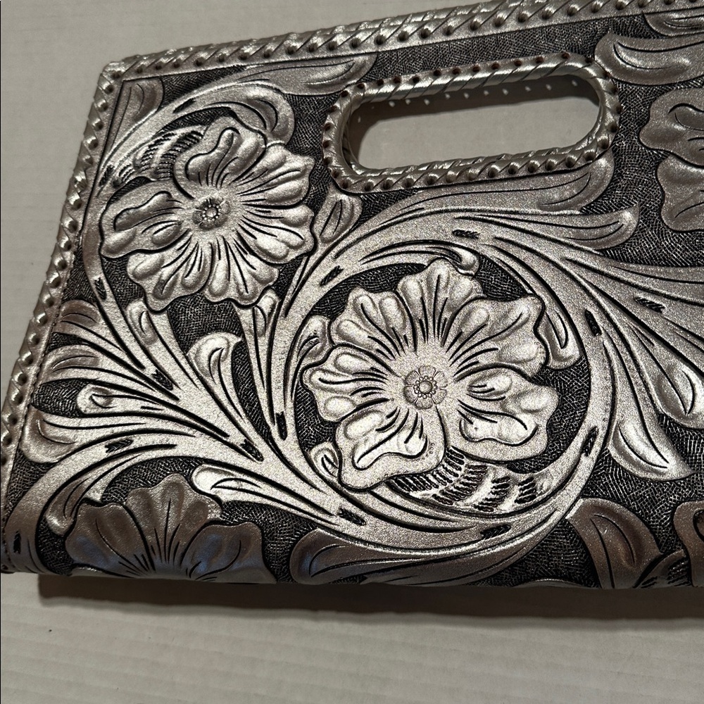 Metallic gray stamped leather handbag.  EUC.  15” wide 9.5” tall.  Zip closure. - Picture 3 of 3